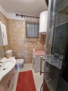 Koupelna v ubytování Apartment Grbac + 43 fotografií