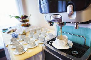 Set per la preparazione di tè e caffè presso Hotel Benica