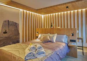 Postel nebo postele na pokoji v ubytování HOTEL LA CABANA BERGA