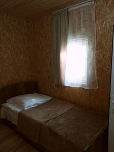 Postel nebo postele na pokoji v ubytování Guesthouse Sagrila