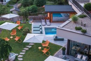 A view of the pool at Hotel Waldrast Dolomites or nearby