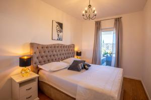 Posteľ alebo postele v izbe v ubytovaní Morska vila 6 Luxury Apartment Žnjan