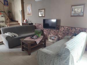 TV a/nebo společenská místnost v ubytování La Palmera de la Insula
