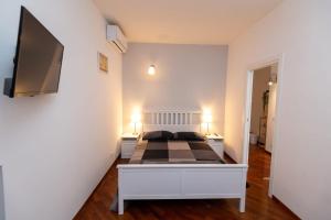 Postel nebo postele na pokoji v ubytování SUITE184