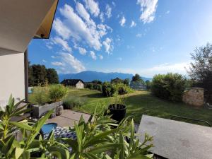 a view from the patio of a house at Montreux Holiday Home in Montreux