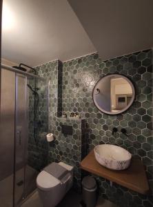 Een badkamer bij Vivere studios