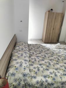 Postel nebo postele na pokoji v ubytování u'chini suite