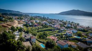 an aerial view of a town next to the water at aMaRe Country House in Caminha
