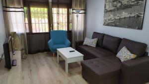 Część wypoczynkowa w obiekcie Atractivo apartamento en la playa con parking