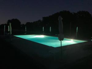 Bazén v ubytovaní Relais jardin San Vivaldo alebo v jeho blízkosti