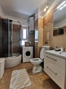 Ένα μπάνιο στο Apartments MilaRoza