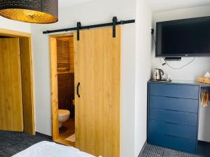 Kuchyňa alebo kuchynka v ubytovaní APLIT GUEST HOUSE
