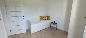 Posteľ alebo postele v izbe v ubytovaní Apartament Lato Nad Morzem + 6 fotografií