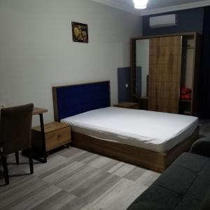 Letto o letti in una camera di MIDIA Guest House