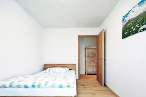 Łóżko lub łóżka w pokoju w obiekcie ROTUND-Nature_Mountain_Living
