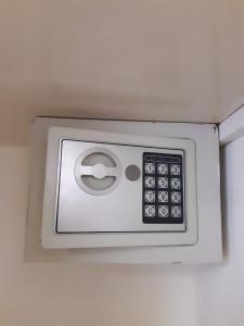a remote control embedded in the ceiling of a room at Selva de Laurel in Puerto Iguazú