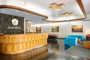 a lobby of a hotel with a waiting room at Ilima Hotel in Honolulu