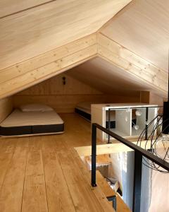 Posteľ alebo postele v izbe v ubytovaní Tiny House LA RUCHETTE