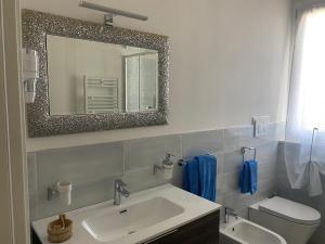 Koupelna v ubytování B&B Il Melograno + 32 fotografií