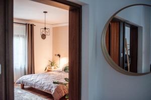 Posteľ alebo postele v izbe v ubytovaní Csendeskert Wellness Apartments - Garden, grill, chill