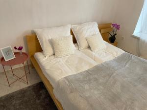 Posteľ alebo postele v izbe v ubytovaní BONI Apartman