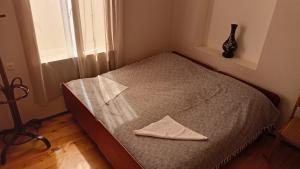 Postel nebo postele na pokoji v ubytování Mero House