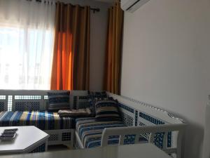 Зона вітальні в Cosy Appart - Central & Near main interest points