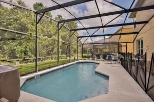 The swimming pool at or close to 7 Bedroom Mansion Near Disney