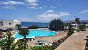 Bazén v ubytovaní Sea view paradise Lanzarote alebo v jeho blízkosti