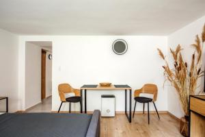 Posteľ alebo postele v izbe v ubytovaní Csendeskert Wellness Apartments - Garden, grill, chill