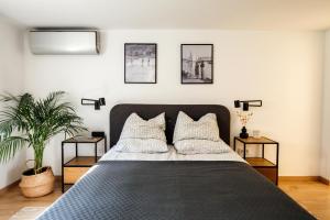 Posteľ alebo postele v izbe v ubytovaní Csendeskert Wellness Apartments - Garden, grill, chill