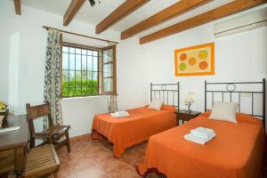 Postel nebo postele na pokoji v ubytování Villa Can Xanet de Baix by Villa Plus