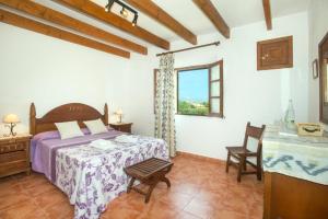 Postel nebo postele na pokoji v ubytování Villa Can Xanet de Baix by Villa Plus