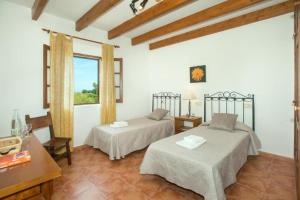 Postel nebo postele na pokoji v ubytování Villa Can Xanet de Baix by Villa Plus