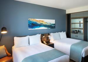 Katil atau katil-katil dalam bilik di Holiday Inn Sydney St Marys, an IHG Hotel