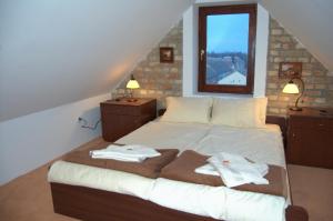 Postel nebo postele na pokoji v ubytování Guest House Prenoćište Piccolina