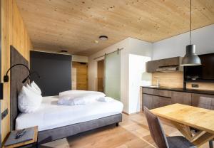 Postel nebo postele na pokoji v ubytování ad-fontanas Appartements Vandans