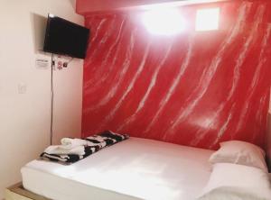 Postel nebo postele na pokoji v ubytování Hotel Jireh - San Carlos Ant