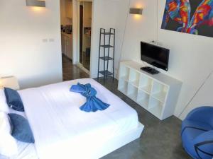 Postel nebo postele na pokoji v ubytování STUDIO DESIGN RESORT 5 Stars