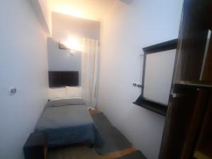 Postel nebo postele na pokoji v ubytování happy life hostel