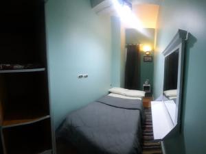 Postel nebo postele na pokoji v ubytování happy life hostel