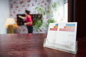 Certificato, attestato, insegna o altro documento esposto da Hotel Atlas