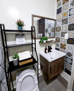 Bagno di Amaia Steps Nuvali fully furnished unit with swimming pool view near Carmelray Pitland