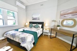 Ένα ή περισσότερα κρεβάτια σε δωμάτιο στο Cozy 3BRM Holiday Staycation Bendigo Lakeside Pet Friendly Free Wifi