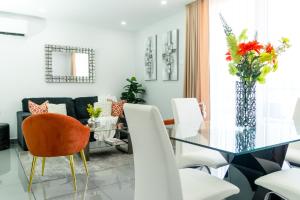 Lujoso y acogedor condominio ejecutivo/familiar的休息区