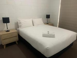 Ein Bett oder Betten in einem Zimmer der Unterkunft Archipelago Apartments Esperance