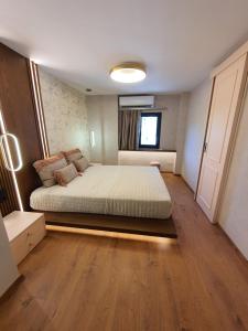 Posteľ alebo postele v izbe v ubytovaní Adell Miramare Golden Loft