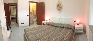 Postel nebo postele na pokoji v ubytování Top Suit Uno - Guest house