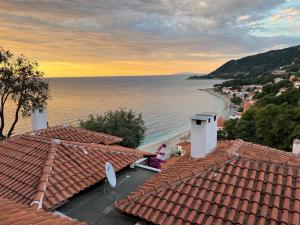 a view of the ocean from the roof of a house at The Odyssey Holiday Home - Agios Ioannis, Pelion in Agios Ioannis Pelio