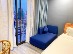 Postel nebo postele na pokoji v ubytování Junlan Hotel